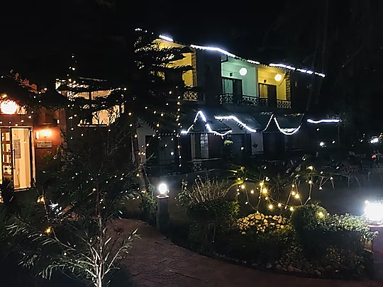 Resort buildings and garden lights at night