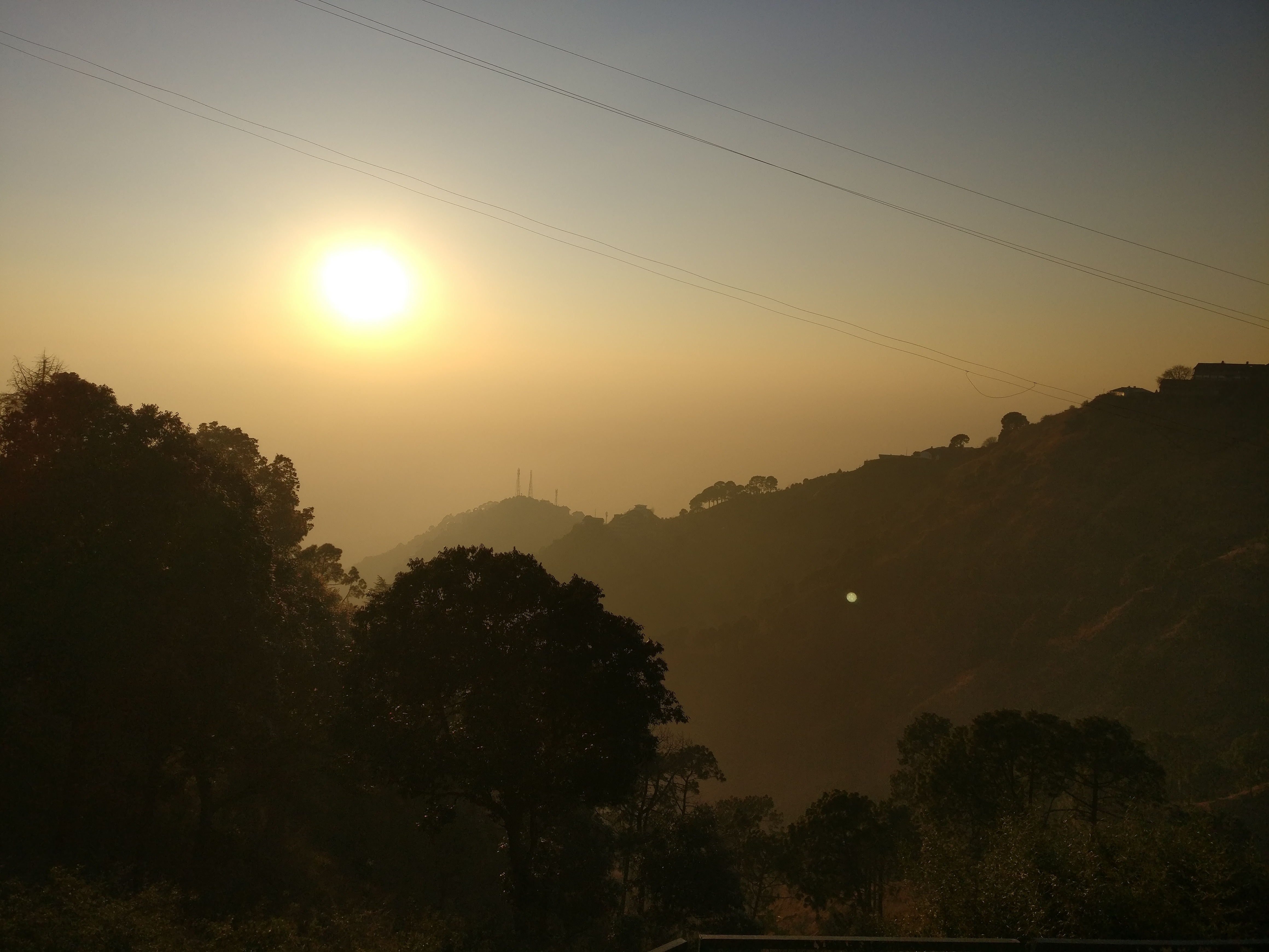 Sun setting over the hills at Sunset Point in Kasauli