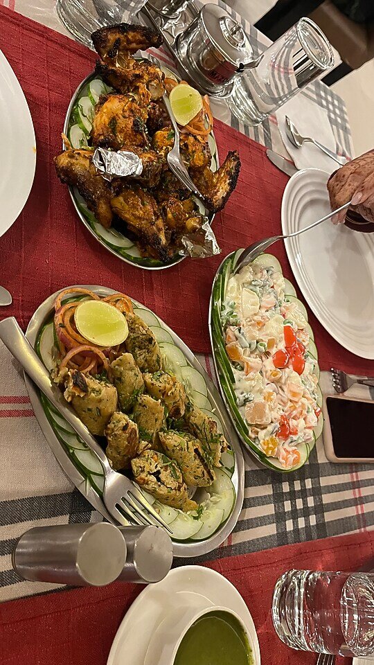 A meal of snacks, vegetables and rice at Marvel Hills