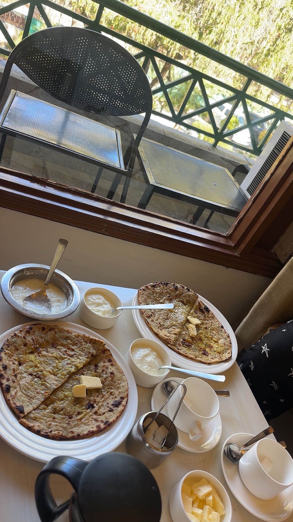Breakfast served beside a garden window