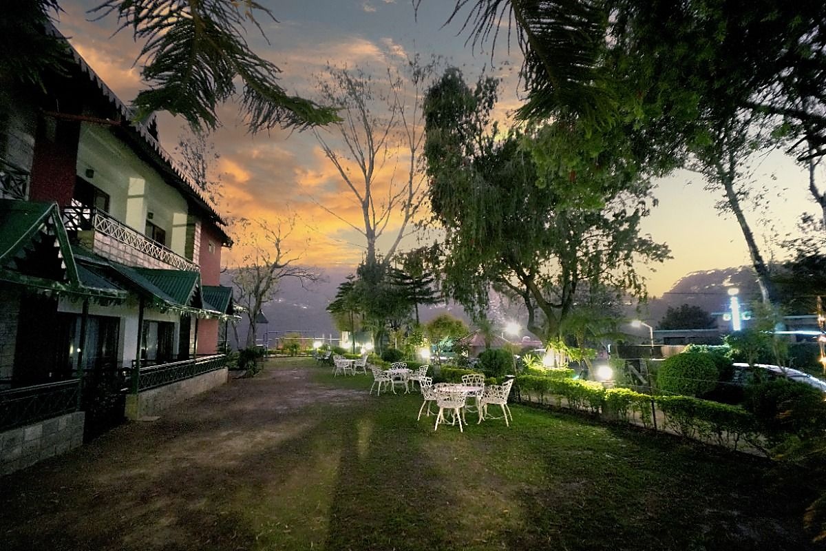 Lawn with seating and soft lights at dusk