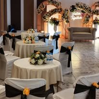 Couple seated at their engagement celebration